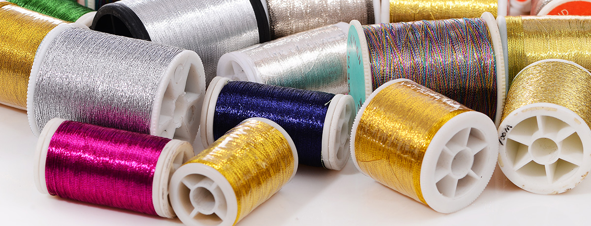 Tableaux de conversion des fils pour la broderie à la machine
